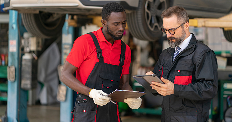 Service Technician Talking to Boss