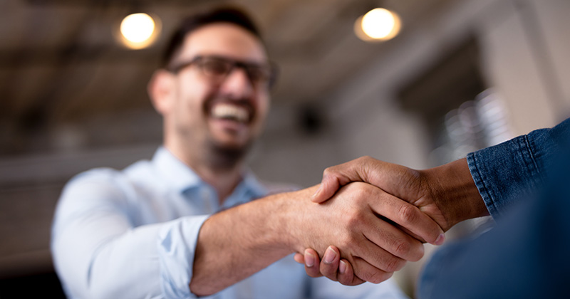 Shaking Hands with Happy Customer