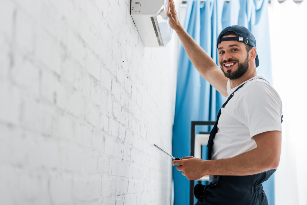 HVAC Employee Smiling On the Job 