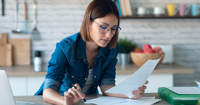 Woman Looking Over Appliance Repair Invoice Template