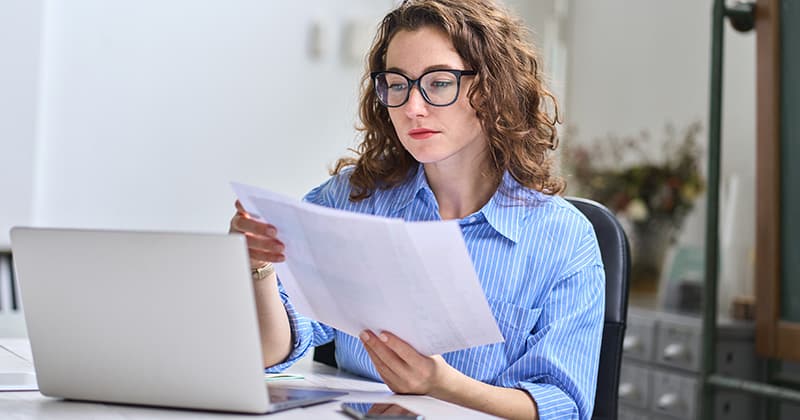 Woman looking at pricing options