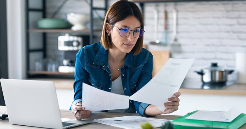 Woman looking at pricing options