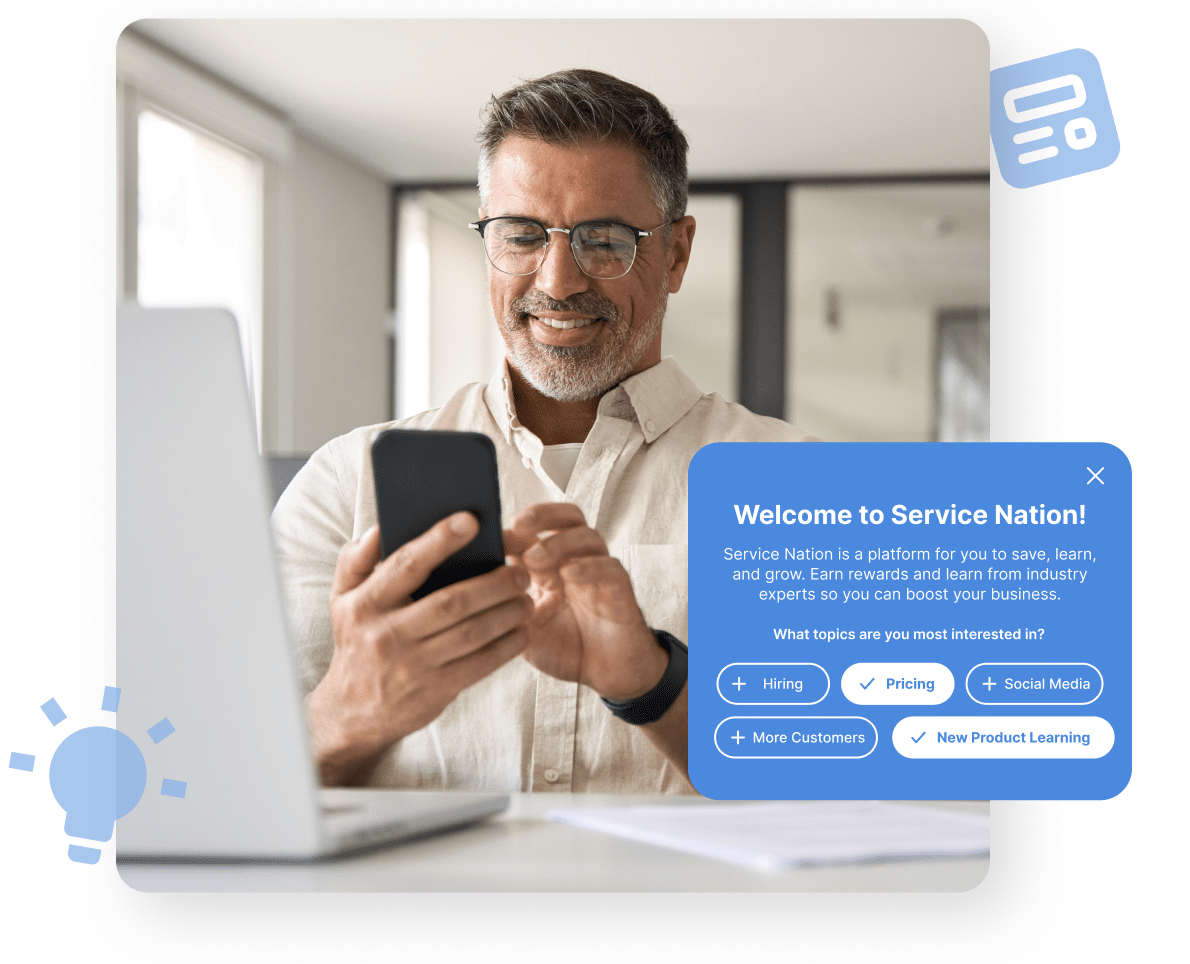 Service business owner using Service Nation resources on a laptop and phone